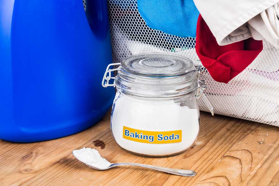 500-baking-soda-with-detergent-and-pile-of-dirty-laund-PMTWJY8 500-baking-soda-with-detergent-and-pile-of-dirty-laund-PMTWJY8