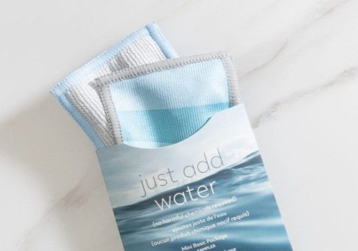 a blue and white cloth in a package
