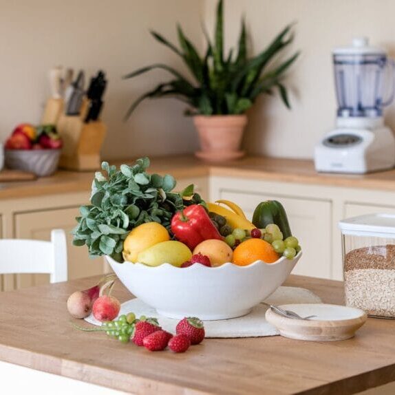 a-feminine-kitchen-setting-with-a-wooden_Pg7_RQpGQ5WDHeEJmzb7_g_5qN8hXmATfW0fbYZro3dLg